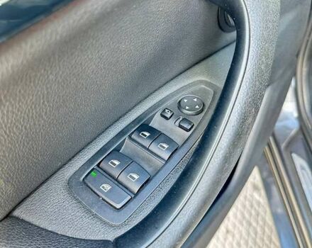 Сірий БМВ Х1, об'ємом двигуна 2 л та пробігом 95 тис. км за 18499 $, фото 24 на Automoto.ua