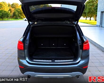 Сірий БМВ Х1, об'ємом двигуна 2 л та пробігом 117 тис. км за 20999 $, фото 6 на Automoto.ua