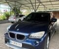 Синій БМВ Х1, об'ємом двигуна 2 л та пробігом 137 тис. км за 11700 $, фото 1 на Automoto.ua