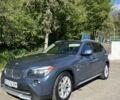 Синій БМВ Х1, об'ємом двигуна 2 л та пробігом 238 тис. км за 10102 $, фото 1 на Automoto.ua