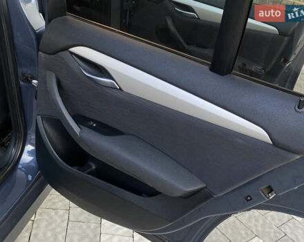 Синий БМВ Х1, объемом двигателя 2 л и пробегом 300 тыс. км за 8899 $, фото 66 на Automoto.ua