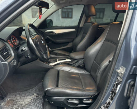Синій БМВ Х1, об'ємом двигуна 2 л та пробігом 297 тис. км за 11499 $, фото 15 на Automoto.ua