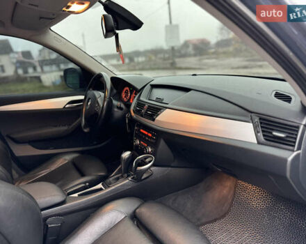 Синій БМВ Х1, об'ємом двигуна 2 л та пробігом 297 тис. км за 11499 $, фото 27 на Automoto.ua