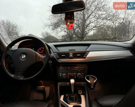 Синій БМВ Х1, об'ємом двигуна 2 л та пробігом 297 тис. км за 11499 $, фото 28 на Automoto.ua