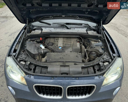 Синій БМВ Х1, об'ємом двигуна 2 л та пробігом 297 тис. км за 11499 $, фото 36 на Automoto.ua