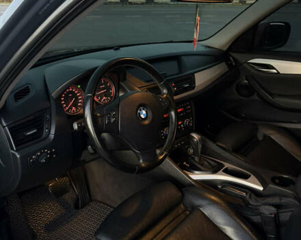 Синий БМВ Х1, объемом двигателя 2 л и пробегом 297 тыс. км за 11700 $, фото 28 на Automoto.ua