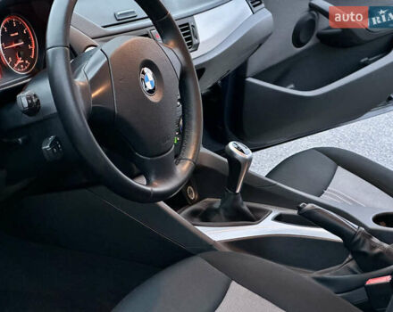 Синий БМВ Х1, объемом двигателя 2 л и пробегом 200 тыс. км за 9999 $, фото 46 на Automoto.ua