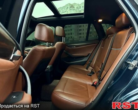 Синий БМВ Х1, объемом двигателя 3 л и пробегом 201 тыс. км за 12000 $, фото 11 на Automoto.ua