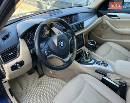 Синий БМВ Х1, объемом двигателя 2 л и пробегом 185 тыс. км за 12000 $, фото 14 на Automoto.ua