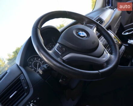Синий БМВ Х1, объемом двигателя 2 л и пробегом 98 тыс. км за 11850 $, фото 36 на Automoto.ua