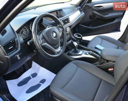 Синий БМВ Х1, объемом двигателя 2 л и пробегом 98 тыс. км за 11850 $, фото 65 на Automoto.ua