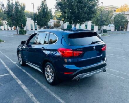 Синий БМВ Х1, объемом двигателя 2 л и пробегом 73 тыс. км за 12600 $, фото 5 на Automoto.ua