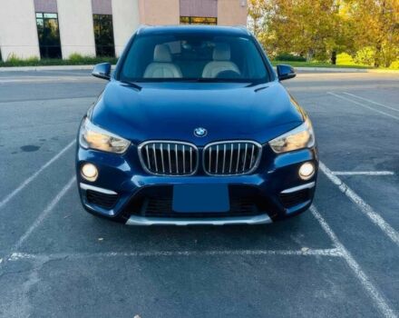 Синий БМВ Х1, объемом двигателя 2 л и пробегом 73 тыс. км за 12600 $, фото 1 на Automoto.ua