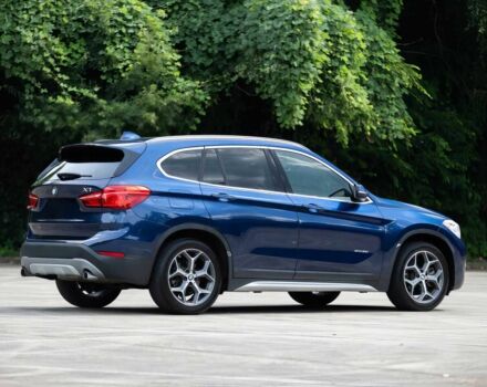 Синій БМВ Х1, об'ємом двигуна 2 л та пробігом 32 тис. км за 15100 $, фото 5 на Automoto.ua