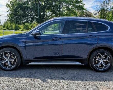 Синий БМВ Х1, объемом двигателя 2 л и пробегом 30 тыс. км за 6500 $, фото 3 на Automoto.ua