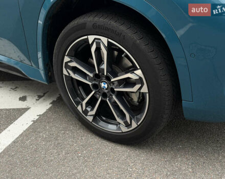 Синий БМВ Х1, объемом двигателя 2 л и пробегом 13 тыс. км за 40799 $, фото 2 на Automoto.ua