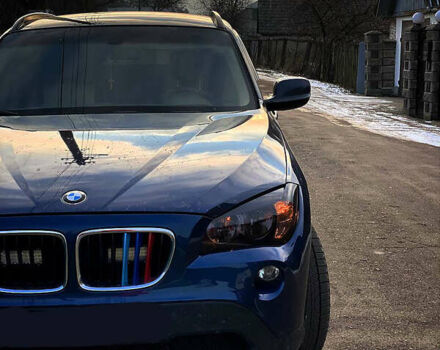 Синий БМВ Х1, объемом двигателя 2 л и пробегом 286 тыс. км за 12599 $, фото 1 на Automoto.ua