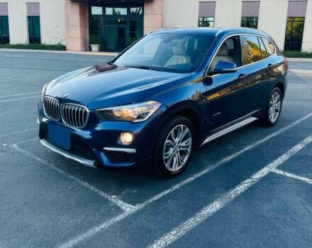 Синий БМВ Х1, объемом двигателя 2 л и пробегом 73 тыс. км за 12600 $, фото 1 на Automoto.ua
