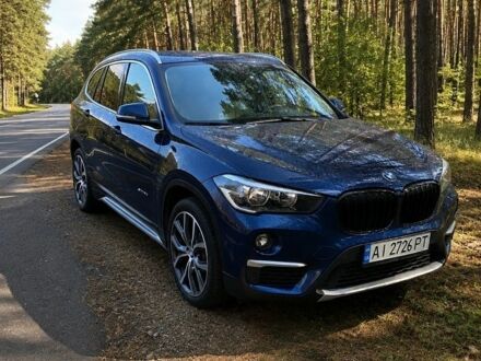 Синій БМВ Х1, об'ємом двигуна 2 л та пробігом 95 тис. км за 19199 $, фото 1 на Automoto.ua
