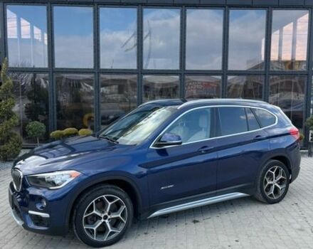 Синий БМВ Х1, объемом двигателя 2 л и пробегом 105 тыс. км за 11300 $, фото 1 на Automoto.ua