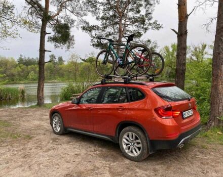 Оранжевый БМВ Х1, объемом двигателя 2 л и пробегом 236 тыс. км за 14000 $, фото 3 на Automoto.ua