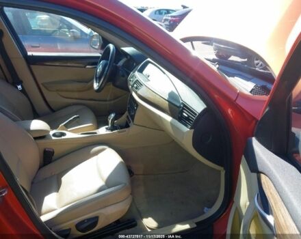 Оранжевый БМВ Х1, объемом двигателя 2 л и пробегом 140 тыс. км за 8500 $, фото 3 на Automoto.ua