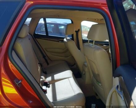 Оранжевый БМВ Х1, объемом двигателя 2 л и пробегом 140 тыс. км за 8500 $, фото 7 на Automoto.ua