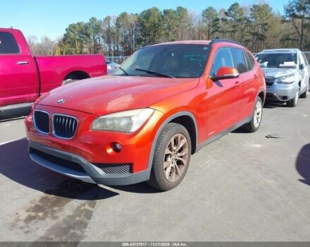 Оранжевый БМВ Х1, объемом двигателя 2 л и пробегом 140 тыс. км за 8500 $, фото 2 на Automoto.ua