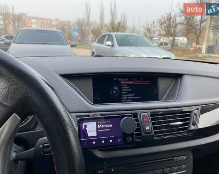 Оранжевый БМВ Х1, объемом двигателя 2 л и пробегом 236 тыс. км за 14000 $, фото 5 на Automoto.ua