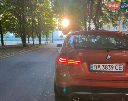 Оранжевый БМВ Х1, объемом двигателя 2 л и пробегом 236 тыс. км за 14000 $, фото 2 на Automoto.ua