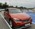 Оранжевый БМВ Х1, объемом двигателя 2 л и пробегом 116 тыс. км за 13400 $, фото 1 на Automoto.ua