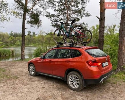 Оранжевый БМВ Х1, объемом двигателя 2 л и пробегом 236 тыс. км за 14000 $, фото 1 на Automoto.ua