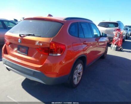 Оранжевый БМВ Х1, объемом двигателя 2 л и пробегом 140 тыс. км за 8500 $, фото 5 на Automoto.ua