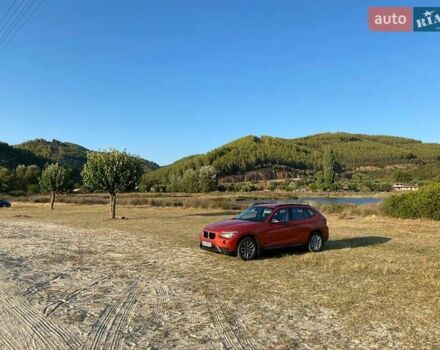Оранжевый БМВ Х1, объемом двигателя 2 л и пробегом 236 тыс. км за 14000 $, фото 4 на Automoto.ua