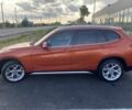 Помаранчевий БМВ Х1, об'ємом двигуна 2 л та пробігом 286 тис. км за 11600 $, фото 3 на Automoto.ua