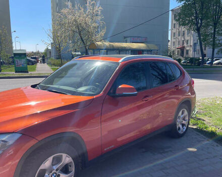 Оранжевый БМВ Х1, объемом двигателя 2 л и пробегом 126 тыс. км за 13300 $, фото 1 на Automoto.ua