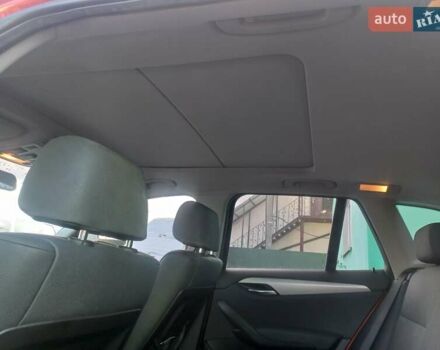 Оранжевый БМВ Х1, объемом двигателя 2 л и пробегом 183 тыс. км за 10500 $, фото 11 на Automoto.ua