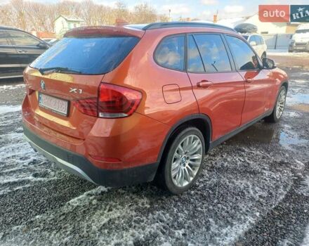 Оранжевый БМВ Х1, объемом двигателя 2 л и пробегом 183 тыс. км за 10500 $, фото 4 на Automoto.ua