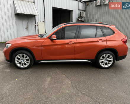 Помаранчевий БМВ Х1, об'ємом двигуна 2 л та пробігом 163 тис. км за 10400 $, фото 1 на Automoto.ua