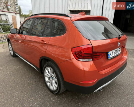Помаранчевий БМВ Х1, об'ємом двигуна 2 л та пробігом 163 тис. км за 10400 $, фото 2 на Automoto.ua