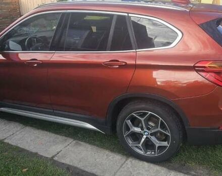 Оранжевый БМВ Х1, объемом двигателя 2 л и пробегом 65 тыс. км за 21600 $, фото 3 на Automoto.ua