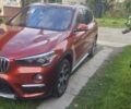 Оранжевый БМВ Х1, объемом двигателя 2 л и пробегом 65 тыс. км за 21600 $, фото 2 на Automoto.ua