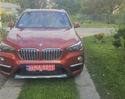 Оранжевый БМВ Х1, объемом двигателя 2 л и пробегом 65 тыс. км за 21600 $, фото 1 на Automoto.ua