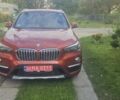 Оранжевый БМВ Х1, объемом двигателя 2 л и пробегом 65 тыс. км за 21600 $, фото 1 на Automoto.ua