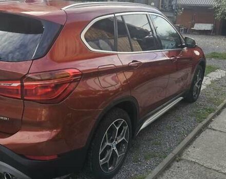 Оранжевый БМВ Х1, объемом двигателя 2 л и пробегом 65 тыс. км за 21600 $, фото 5 на Automoto.ua
