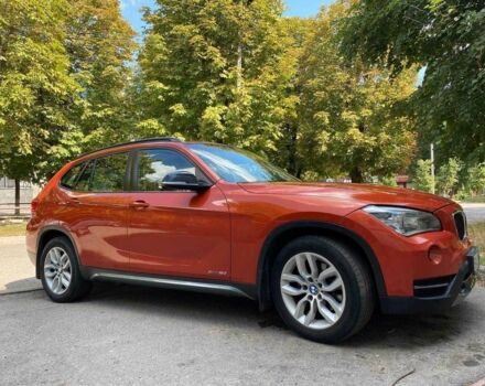 Оранжевый БМВ Х1, объемом двигателя 2 л и пробегом 236 тыс. км за 14000 $, фото 1 на Automoto.ua