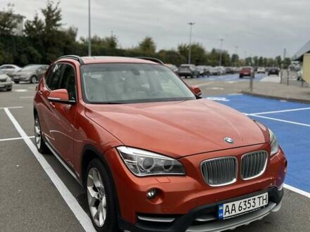 Оранжевый БМВ Х1, объемом двигателя 2 л и пробегом 116 тыс. км за 13400 $, фото 1 на Automoto.ua