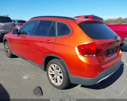 Оранжевый БМВ Х1, объемом двигателя 2 л и пробегом 140 тыс. км за 8500 $, фото 1 на Automoto.ua