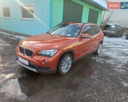 Оранжевый БМВ Х1, объемом двигателя 2 л и пробегом 183 тыс. км за 10500 $, фото 1 на Automoto.ua