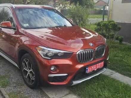 Помаранчевий БМВ Х1, об'ємом двигуна 2 л та пробігом 65 тис. км за 21600 $, фото 1 на Automoto.ua